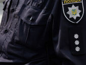 На Печерске водители выясняли отношения на дороге с ружьем и молотком